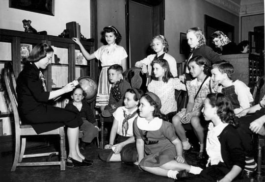 Photo of childern listening to stories