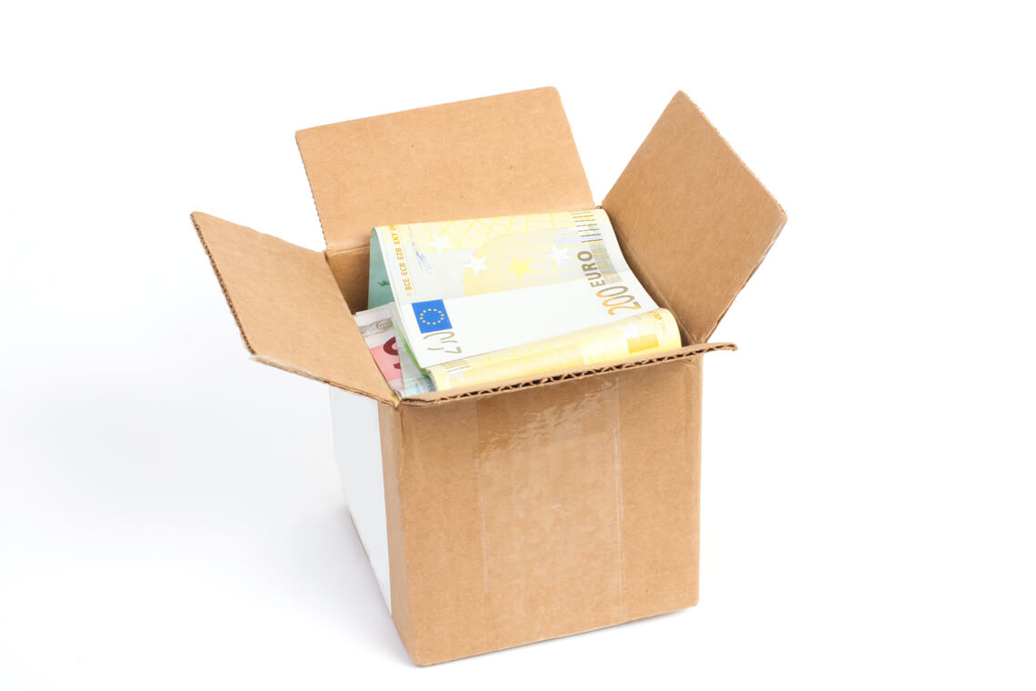 Package box with money. Free shipping is no longer optional but essential for business to thrive.