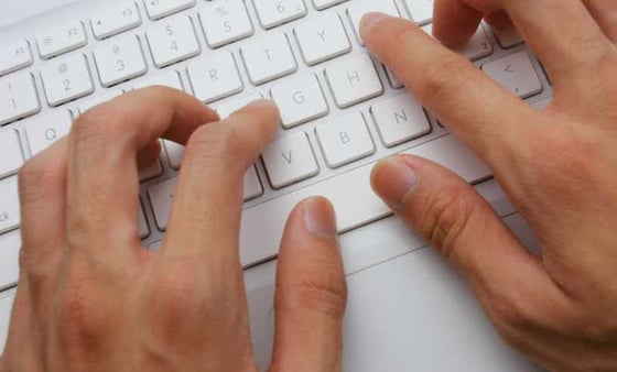 Photo of hands typing