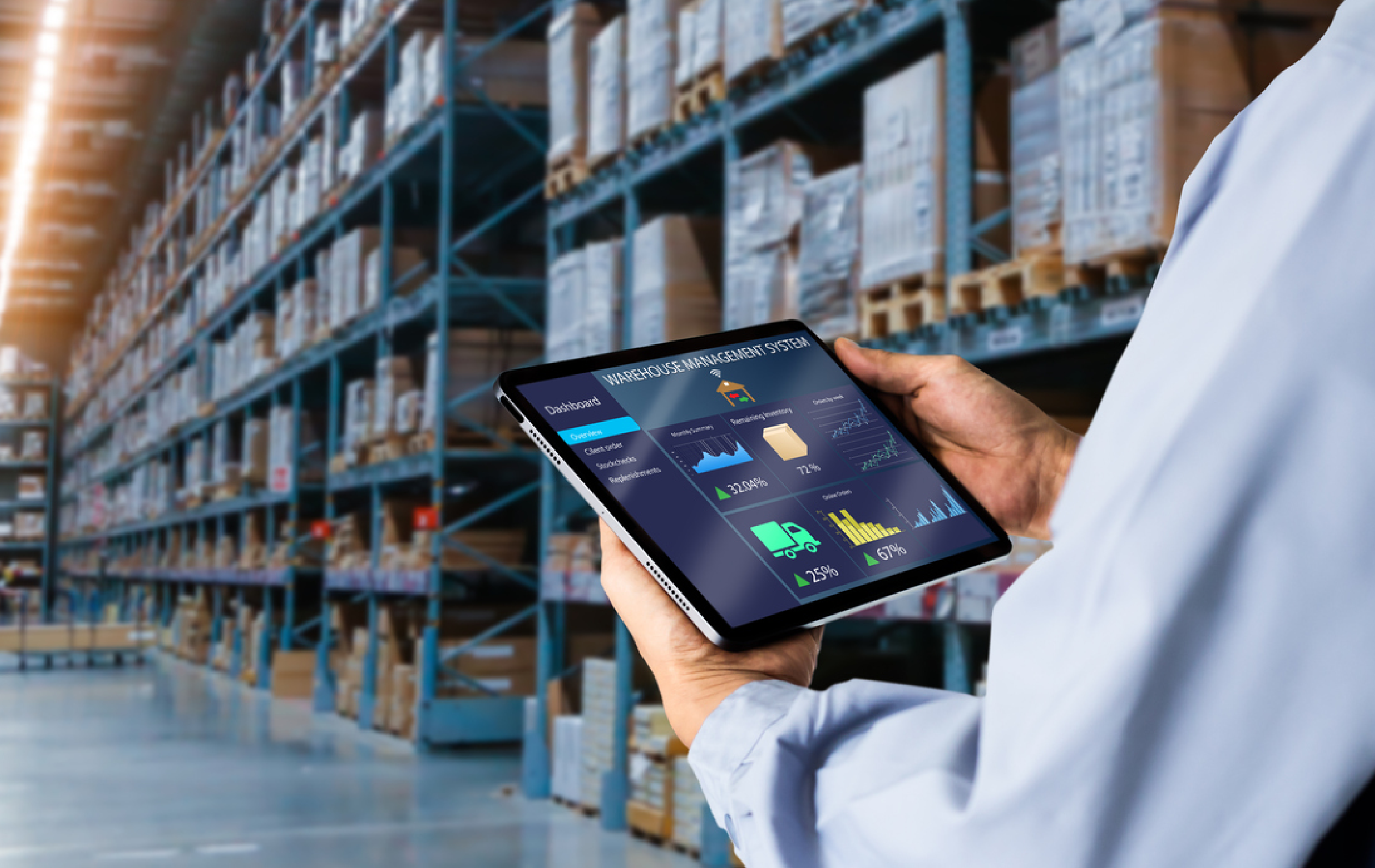 A person holding a tablet with management system in a warehouse