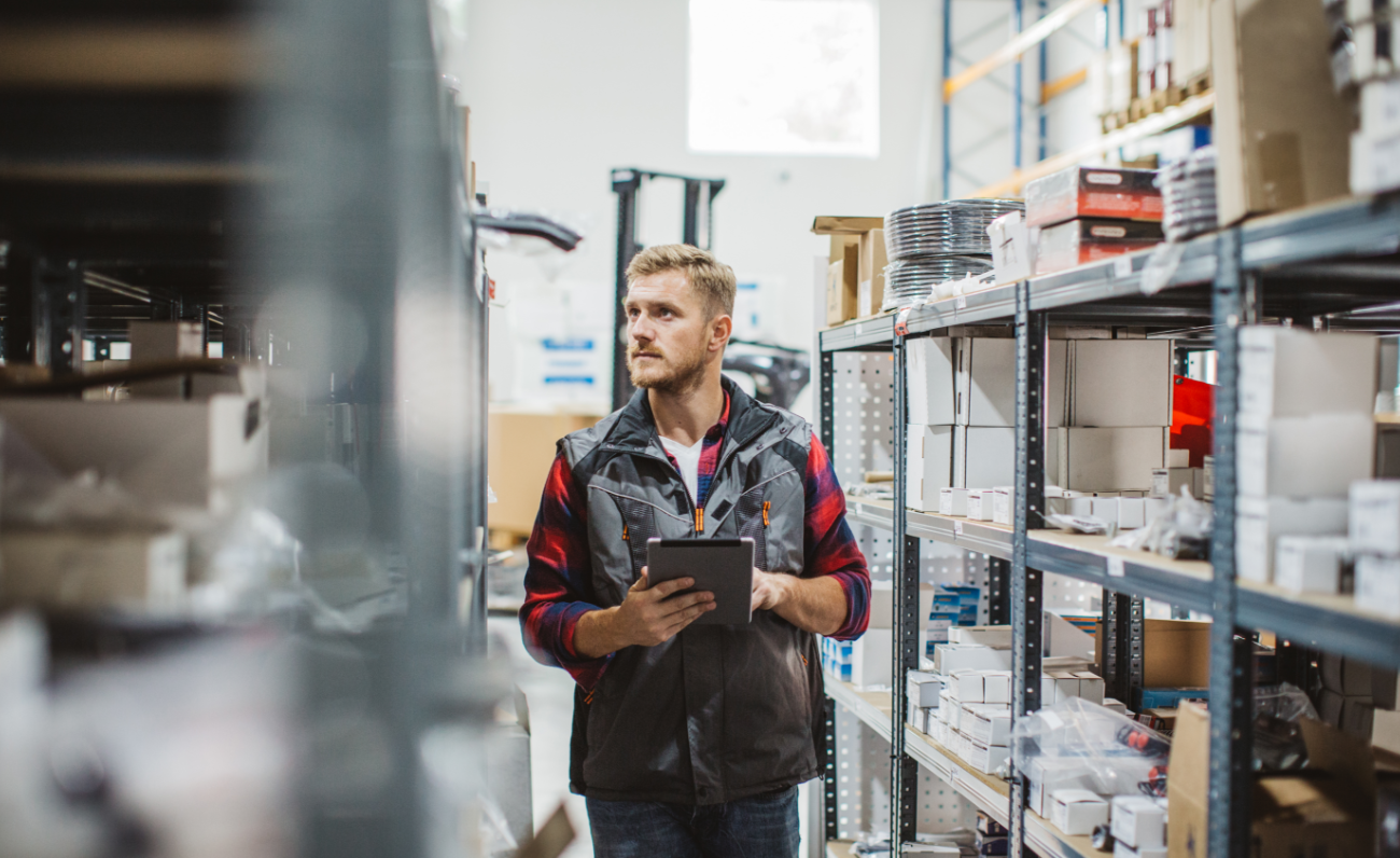 Auto parts ecommerce seller managing inventory in a warehouse, highlighting the shift from Amazon dependence to owning operations and fulfillment.